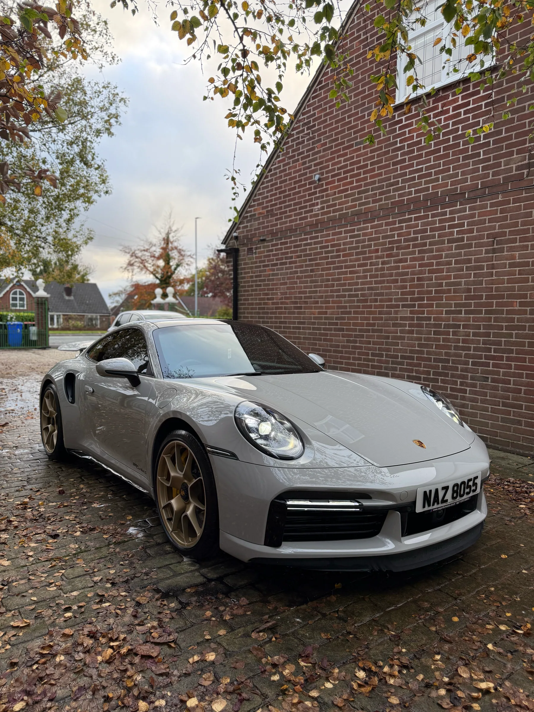 Grey Porsche front three-quarter exterior after detailing