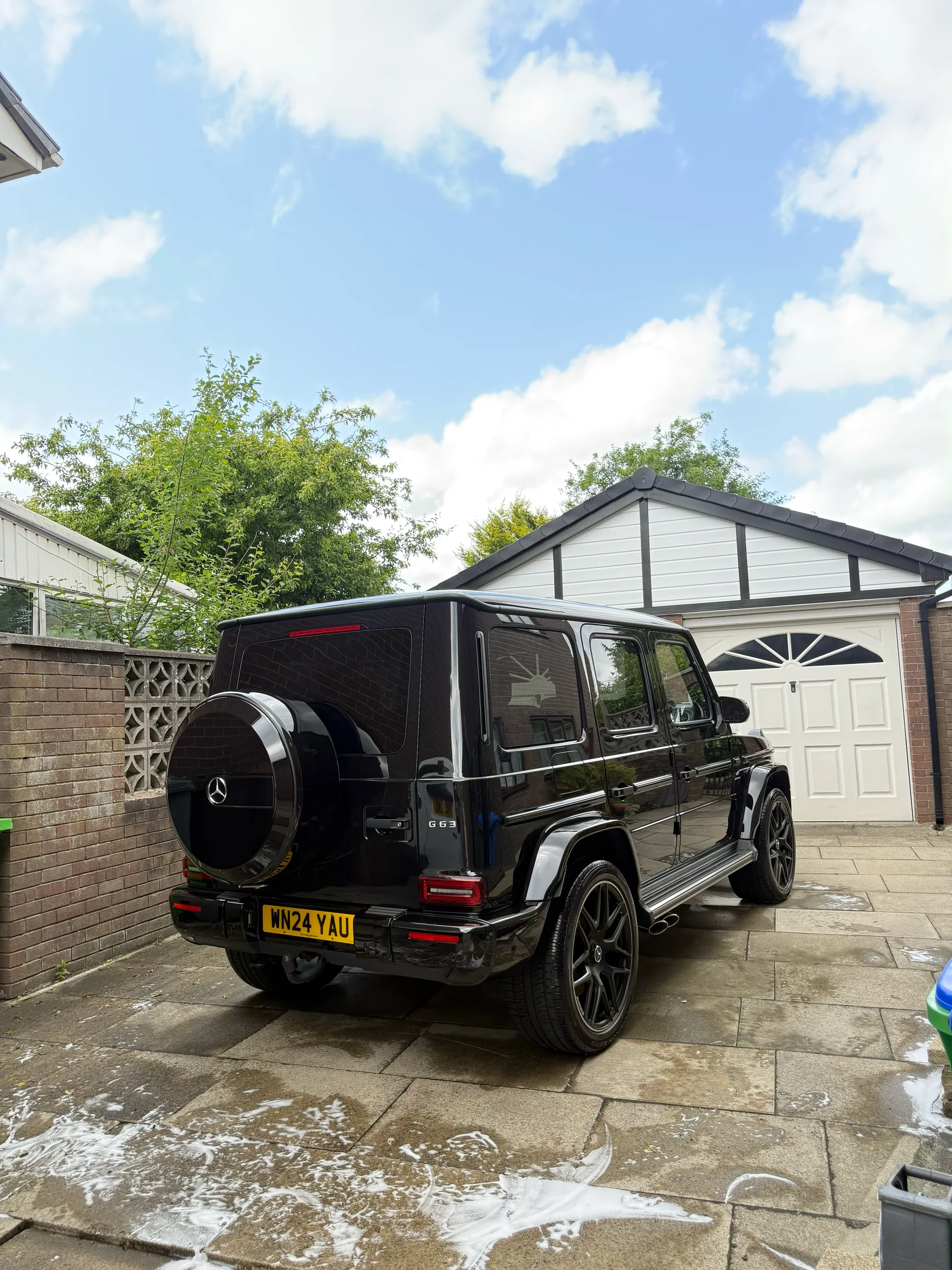 Black Mercedes-Benz G-Class rear exterior after detailing